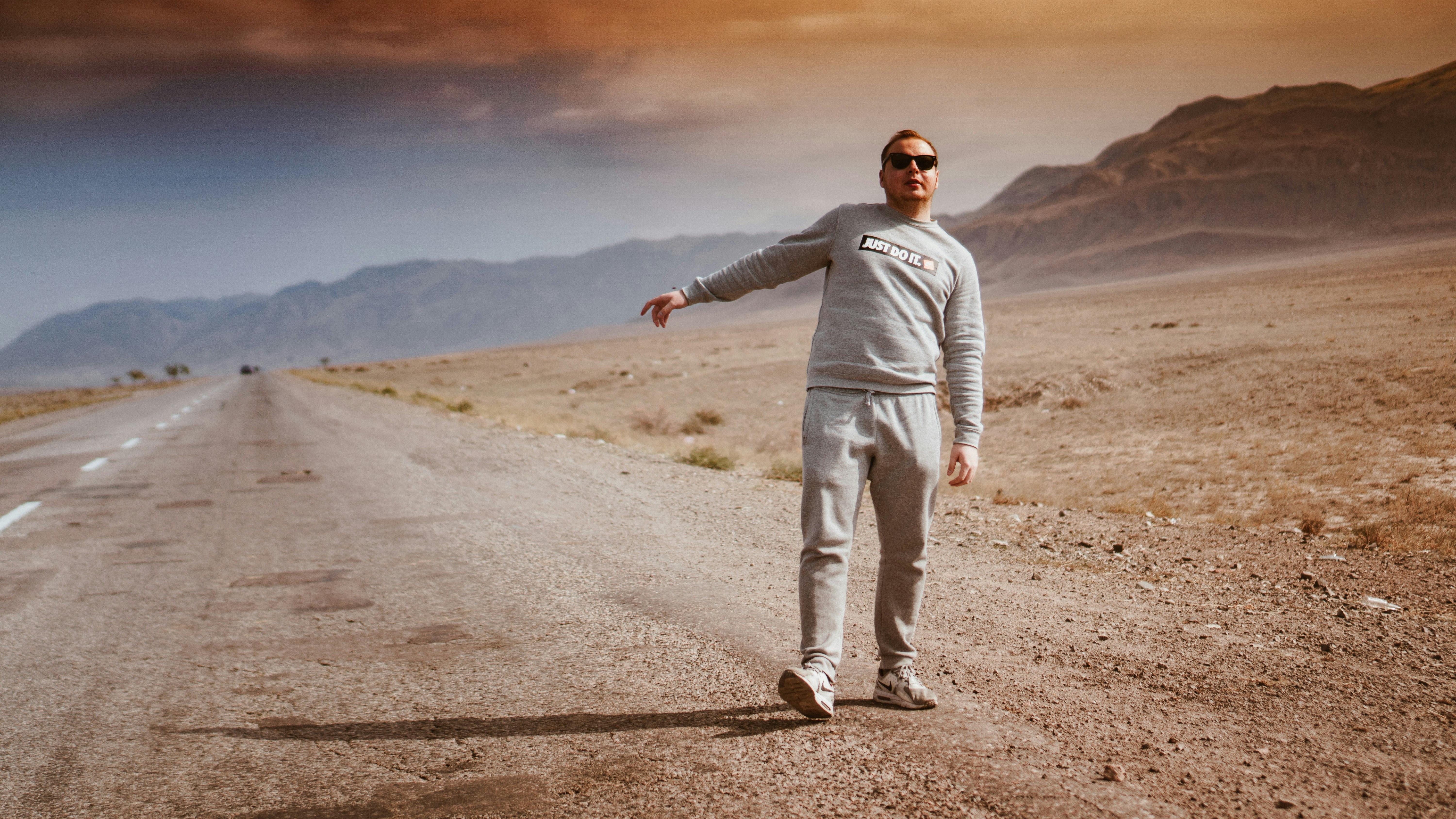 man walking on desert